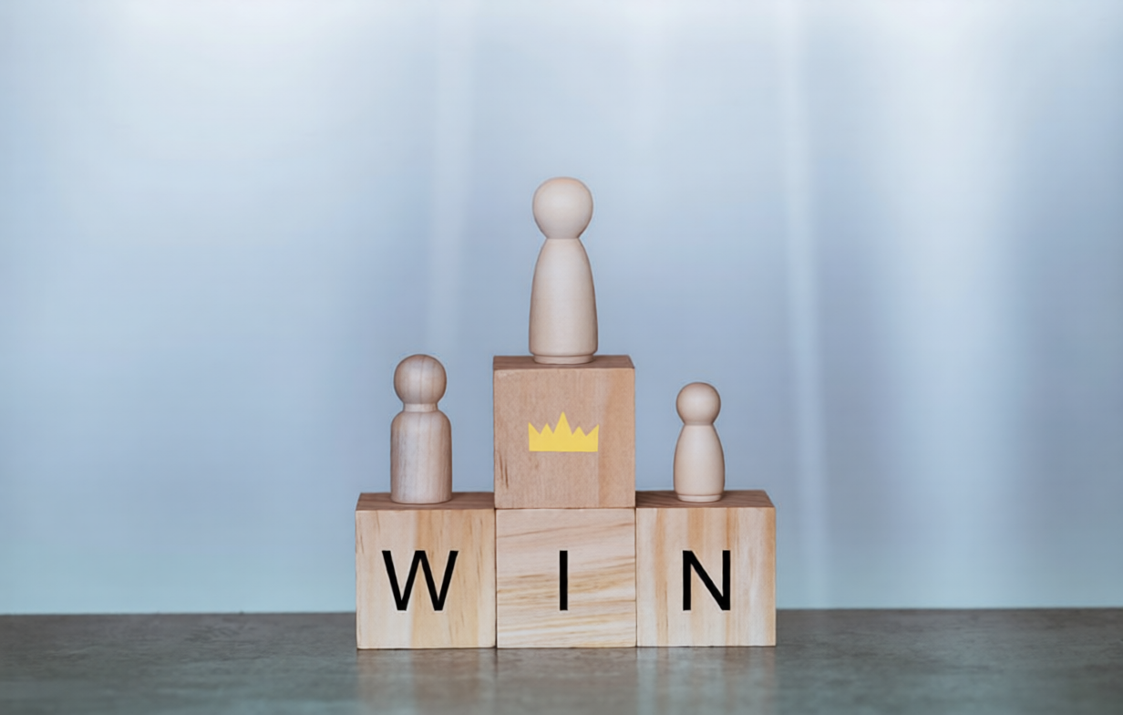 Champion and win concept. Wood block with and word win, wooden doll, Business and success concept.