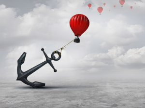 Held back metaphor as a large anchor holding or oppressing an air balloon and restricting movement as a suppression business metaphor from aspiring to succeed with 3D illustration elements.