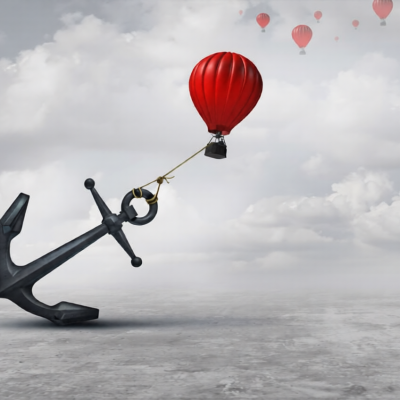 Held back metaphor as a large anchor holding or oppressing an air balloon and restricting movement as a suppression business metaphor from aspiring to succeed with 3D illustration elements.